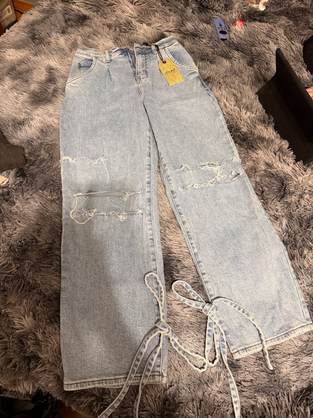 Vibrant Light Blue Distressed Wide-Leg Jeans with Tie Hems